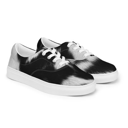 Women’s lace-up canvas cow print shoes